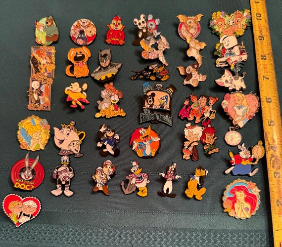 Assorted classic cartoon badge pins listing #3 of Disney Looney Tunes Mickey Gremlins Batman sorry no international shipping from this shop