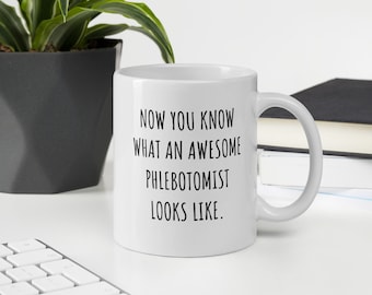 PINK This is what an AWESOME Phlebotomist Looks like SILVER Mug Gift idea work PINK This is what an AWESOME Phlebotomist Looks like SILVER Mug Gift idea work