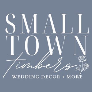 a logo for a company called "Small Town Timbers", which specializes in wedding decor and more.
