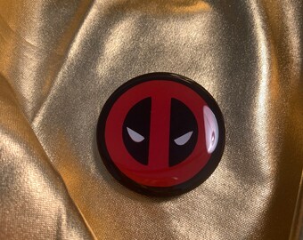 deadpool ear gauges