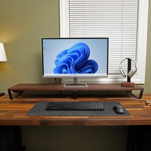 modern matte black desk shelf leg monitor stand base durable steel with cork pad 10" depth minimalist design leg for office organization.jpg