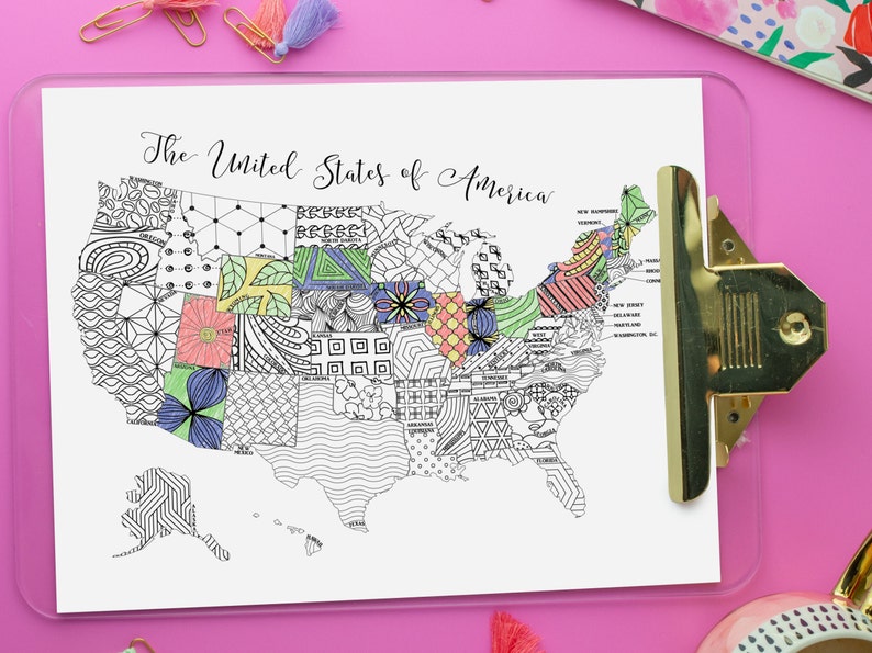 Printable coloring page map of the USA, with text along the top that reads, The United States of America. The map is partially colored in shades of green, blue, yellow, red, and orange. Each state is labeled and has a different, intricate design.