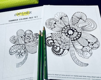 Conjunto de dos páginas para colorear de trébol Zendoodle dibujadas a mano