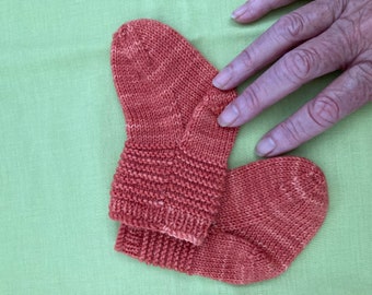 Hand knitted merino wool in apricot. Baby socks. baby gift, baby shower.