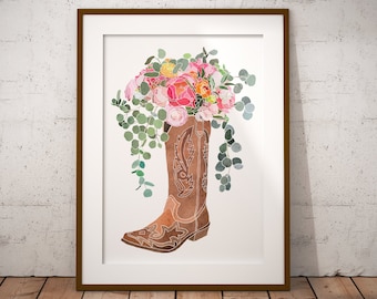 May include: A watercolor painting of a brown cowboy boot filled with pink, white, and yellow flowers and green eucalyptus leaves.