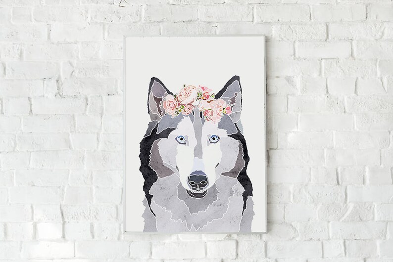 May include: A watercolor painting of a wolf's face with a pink flower crown. The wolf has blue eyes and a gray and black coat.