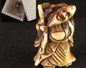 A Japanese METSUKE Hermit Sennin Gourd Miniature sculptures carved in Edo