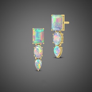 May include: A pair of gold earrings with iridescent opal stones. The earrings feature a square-shaped opal at the top, followed by a round opal, and a teardrop-shaped opal.