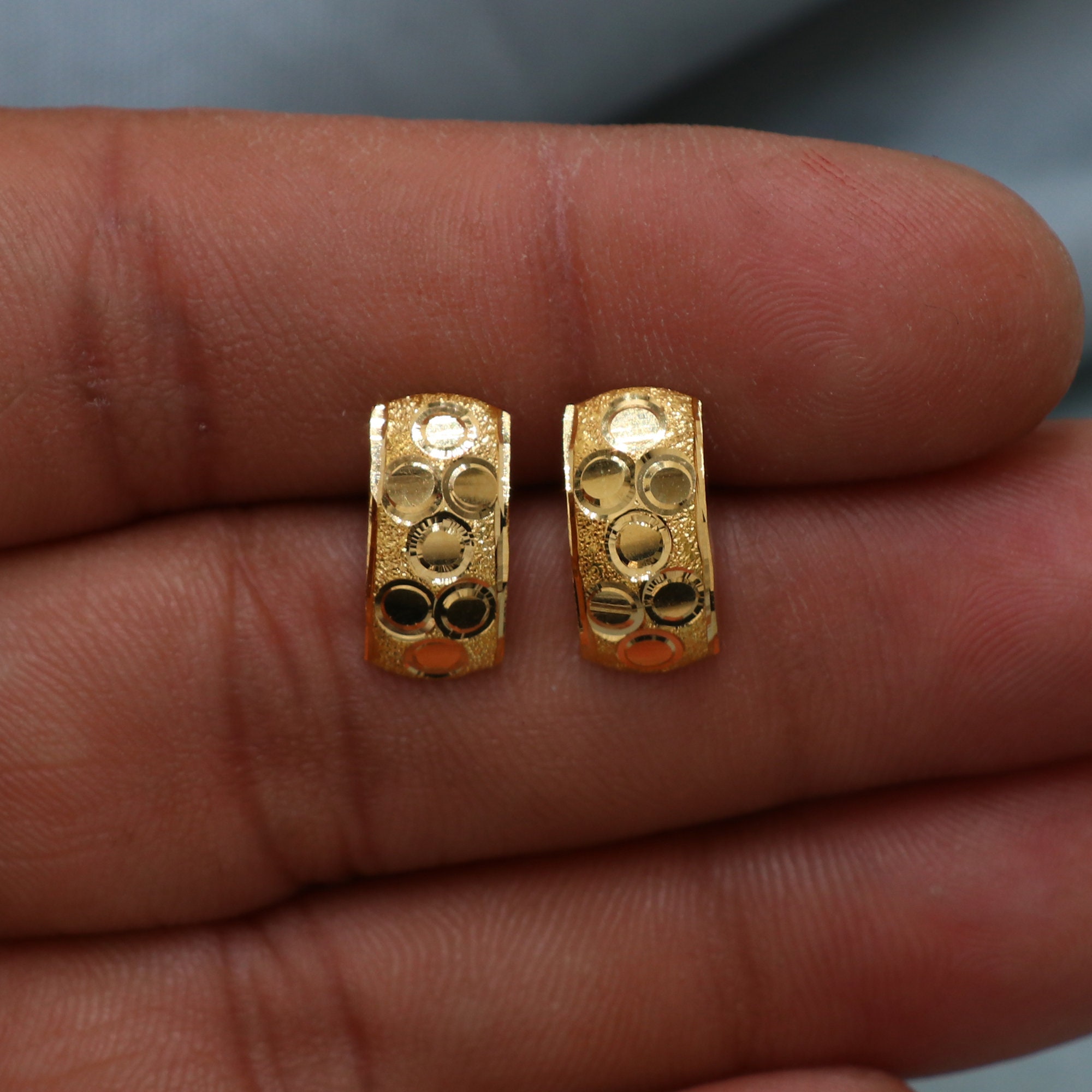 Half pavan gold sales earrings