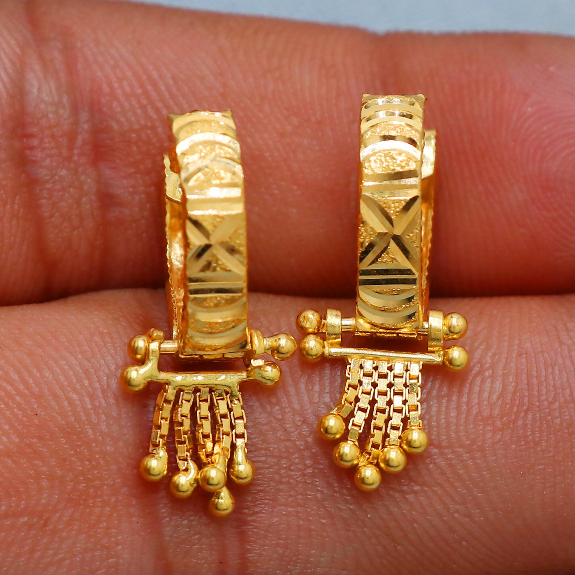 Gold kundal design deals
