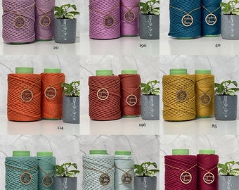 May include: Nine different colours of cotton rope, each wound into two spools, with a wooden tag that says "Sydney Yarn".