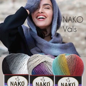 May include: Three skeins of Nako Vals yarn featuring gradient color transitions. The left skein transitions from black to gray to white. The middle skein features beige, purple, and blue tones. The right skein displays teal, yellow, brown, and red.