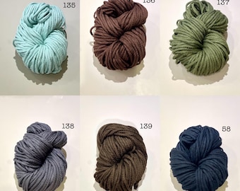 May include: Six balls of cotton rope in different colors: light blue, brown, green, gray, dark brown, and dark blue. Each ball is labeled with a number.