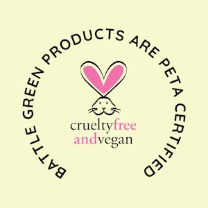 May include: A black and white circle with the text "Little Green Products Are Peta Certified" around the outside. Inside the circle is a black and white bunny with pink ears and the text "crueltyfree andvegan".