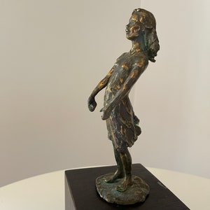 Antique bronze figurative sculpture of girl