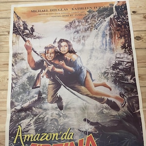1984 Romance con la piedra. Póster original de una hoja de película. Cartel de época. Obra de arte. Arte cinematográfico. Cartel de película de aventuras. Ilustraciones del cartel.