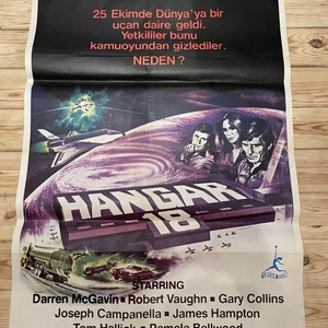 1980. Hangar 18. Póster de película de ciencia ficción de los años 80. Póster original de una hoja de película. Cartel de época. Obra de arte. Arte cinematográfico. Cartel retro.