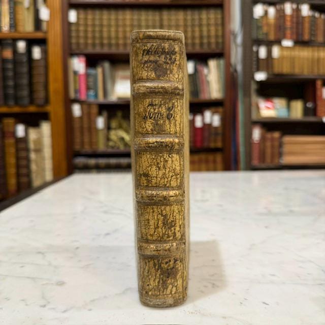M. Tullii Ciceronis Philosophicorum Pars Secunda, Continens De Natura Deorum Libros III, De Divinatione Libros II, De Fato Librum I, De Legibus Libros III, and Fragmenta Librorum Philosophicorum; with M. Tullii Ciceronis De Officiis Libri III, Cato Maior, Seu De Senectute, Laelius, Seu De Amicitia, Paradoxa Stoicorum Sex, Fragmenta Poematum Including the Aratea, and De Petitione Consulatus. Ex Dionysii Lambini Emendatione. Translated: Cicero, Marcus Tullius. Philosophical Works, Parts Two and Three, Containing On the Nature of the Gods, On Divination, On Fate, On the Laws, On Duties, On Old Age, On Friendship, the Stoic Paradoxes, Poetical Fragments Including the Aratea, and On Canvassing for the Consulship. Edited and Annotated by Denis Lambin. Two Parts Bound in One Volume. — photograph 5.