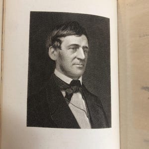 May include: A black and white portrait of a man in a suit and bow tie. The portrait is a detailed engraving, likely from a book or publication. The man has short hair and a serious expression.