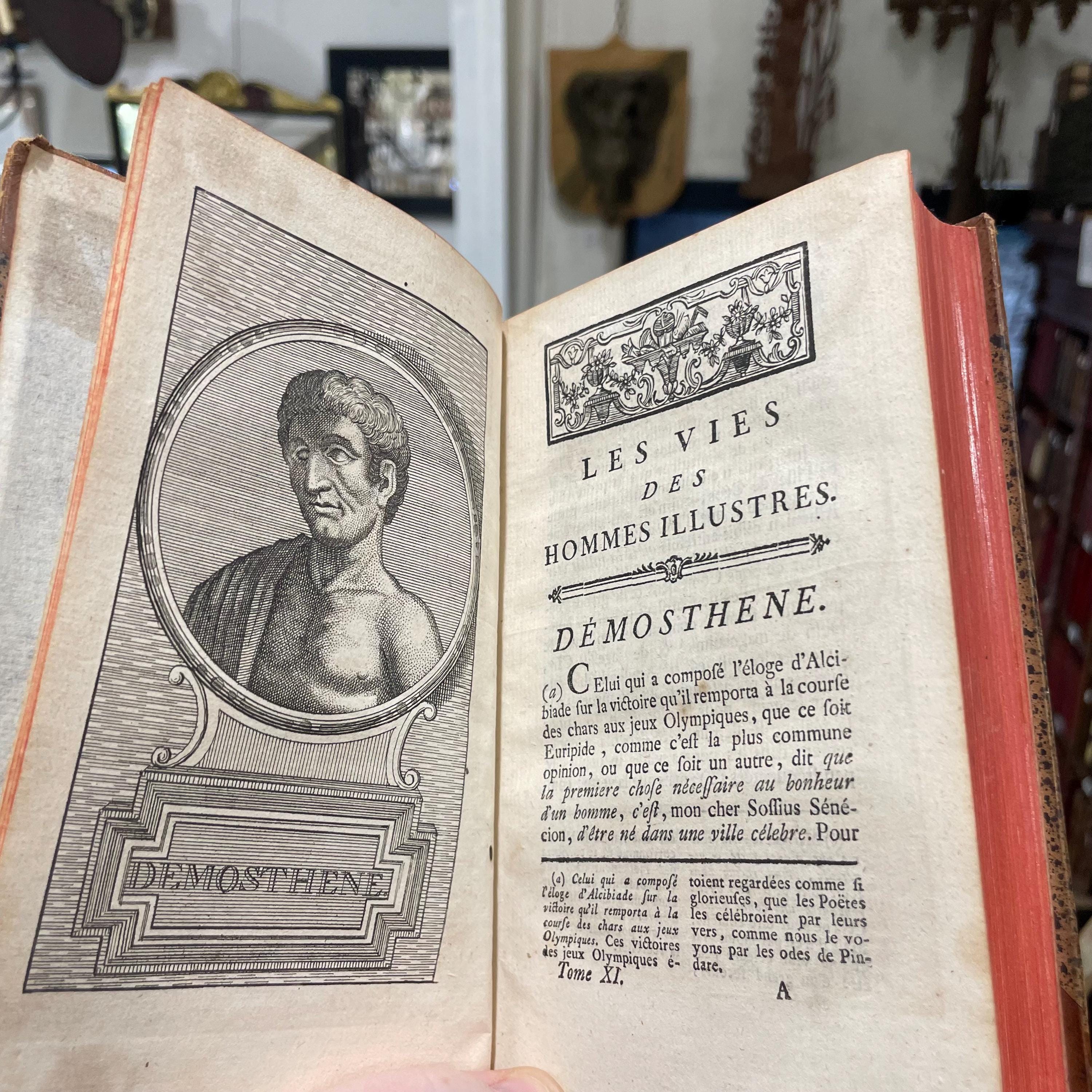 Les Vies Des Hommes Illustres De Plutarque, Traduites en français, avec des remarques historiques & critiques, par M. Dacier, de l’Académie royale des inscriptions & belles-lettres, &c. Nouvelle édition, revue & corrigée, Tome Premier. Contenant Les Vies de Thésée, de Romulus, de Lycurgue, de Numa Pompilius. TRANSLATION: The Lives Of Illustrious Men Of Plutarch, Translated into French, with historical & critical remarks, by M. Dacier, of the Royal Academy of Inscriptions & Belles-Lettres, etc. New Edition, Revised & Corrected, First Volume,
Containing The Lives of Theseus, of Romulus, of Lycurgus, of Numa Pompilius. — photograph 6.