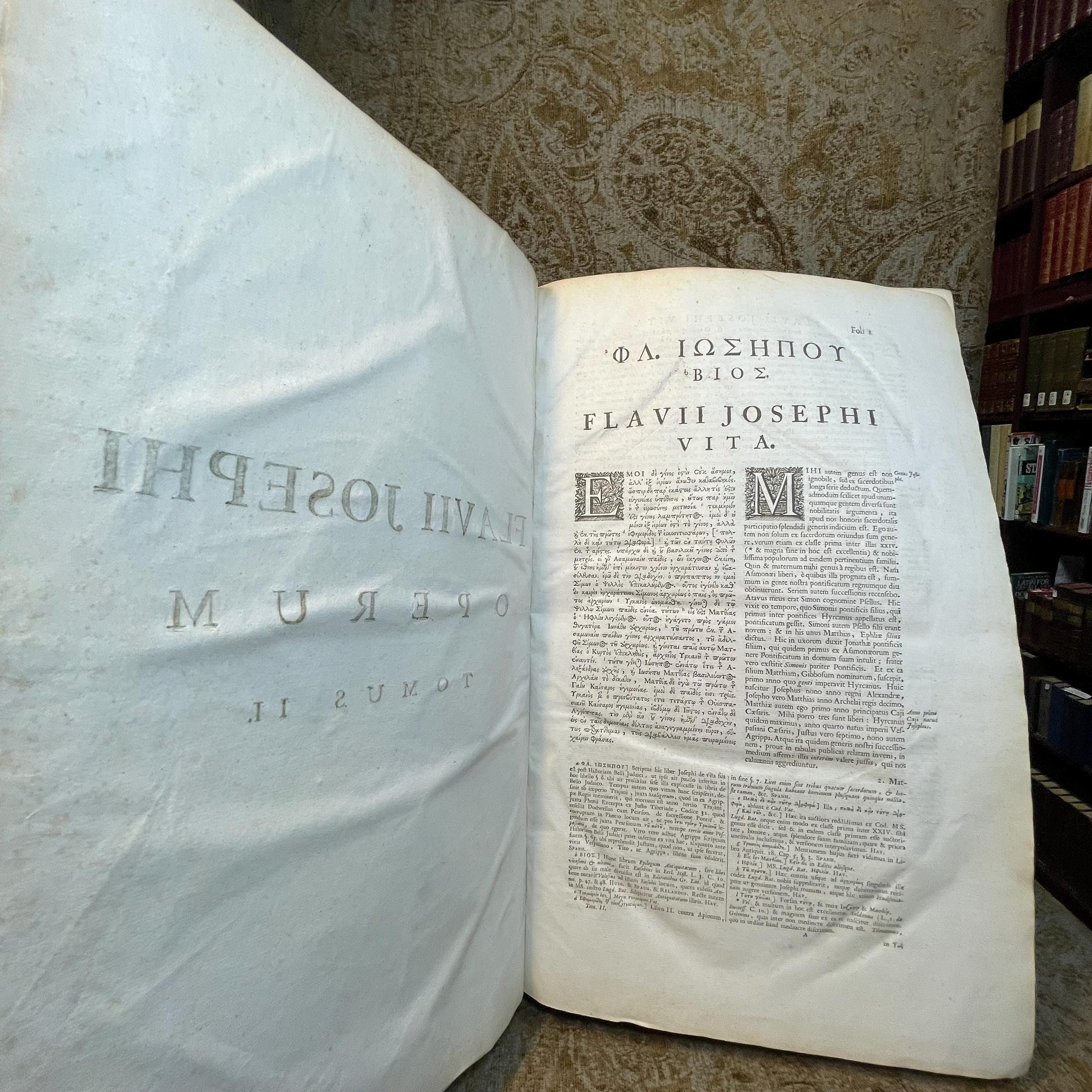 Flavii Josephi Quae Reperiri Potuerunt, Opera Omnia Graece et Latine, Cum Notis & Nova Versione Joannis Hudsoni, S.T.P. Aulae B. Mariae Virginis Principalis, & Bibliothecarii Bodlejani. Accedunt Nunc Primum Notae Integrae, ad Graeca Josephi & Varios Ejusdem Libros, D. Eduardi Bernardi, Jacobi Gronovii, Francisci Combefisii, Jo. Sibrandae, Hendr. Aldrichii. Ut & Ineditae In Universa Fl. Josephi Opera, Joannis Covvei, Ezechielis Spanhemii, Hadriani Relandi, & Selectae Aliorum. Adjiciuntur In Fine Caroli Daubuz Libri duo pro Testimonio Fl. Josephi de Jesu Christo; Et ejusdem Argumenti Epistolae XXX. virorum Doctorum, ut Reinesii, Snellii, Jo. Fr. Gronovii aliorumque, Philologicae & Historicae; ut & Petri Brinch Examen Chronologiae & Historiae Josephicae; Jo. Baptist. Ottii Animadversiones as Josephum & specimen Levici Flaviani; Christ. Noldii Historia Ideumaea, seu de Vita & Gestis Herodum &c. &c. Quorum Syllabus exstat ante Libri Primi Antiquitatum. Omnia collegit, disposuit, & post Jo. Hudsonum ad Codices fere omnes, cum inpressos, tum Manuscriptos, praecipue Lugduno-Batavos, diligenter recensuit, Notasque passim suas, & quinque in fibe Indices adjecit Sigebertus Havercampus; Linguae Graeca, Historiarum & Eloquentiae Professor, in Academia, quae Lugduni est, Batava. Tomis Duobus. Translated from Latin: "The Complete Works of Flavius Josephus That Could Be Found, in Greek and Latin, with Notes & a New Translation by John Hudson, S.T.P., Principal of St. Mary’s Hall and Bodleian Librarian. Additional Notes for the Greek Texts of Josephus and Various Books, by Edward Bernard, Jacob Gronovius, Francis Combefis, John Sibranda, Henry Aldrich. Also Added for the First Time are the Unpublished Notes on All of Flavius Josephus's Works by John Covell, Ezechiel Spanheim, Adriaan Reland, and Selected Others. Included at the End are Two Books by Charles Daubuz in Defense of Flavius Josephus's Testimony About Jesus Christ, as well as 30 Epistles of Learned Men on the Same Subject, such as Reinesius, Snellius, John Frederic Gronovius, and Others, Philological & Historical. Furthermore, Peter Brinch’s Examination of the Chronology and History of Josephus; John Baptist Ott’s Observations on Josephus and Specimen of Flavian Levite; Christian Nold's History of Idumea, or the Life & Acts of the Herods, etc., etc., the List of Which is Found Before the First Book of Antiquities. All Collected, Organized, and After John Hudson Were Carefully Reviewed Against Almost All the Codices, Both Printed and Manuscript, Especially Those of Leiden, with Notes Throughout by Sigebert Havercamp, Professor of the Greek Language, History, and Eloquence at the Academy of Leiden. In Two Volumes." — photograph 5.