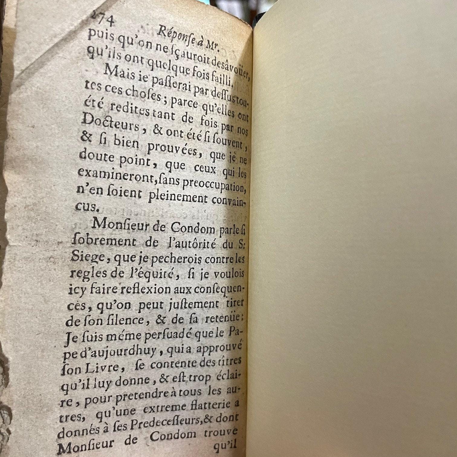 Exposition De La Doctrine De L'eglise Catholique Sue les Matieres de Controverse. Par Messire Jacques Benigne Bossuet... Derniere Edition --- AND --- Re'ponse Au Livre de Mr. de Condom Intitule', Exposition de la Doctrine de l'Eglise Catholique, sur les Matieres de Controverse. Par Mr. de Brueys, Avocat de Montpelier. Derniere Edition, dans lauelle les Pages citees du Livre de Monsieur de Condom, sont reglees sur l'impression de ce Pai's. Translated from French: Exposition of the Doctrine of the Catholic Church on Controversial Matters. By Messire Jacques-Bénigne Bossuet... Latest Edition --- AND --- Response to the Book by Mr. de Condom Entitled 'Exposition of the Doctrine of the Catholic Church on Controversial Matters.' By Mr. de Brueys, Lawyer from Montpellier. Latest Edition, in which the cited pages from Mr. de Condom's book are aligned with the printing of this country. — photograph 6.