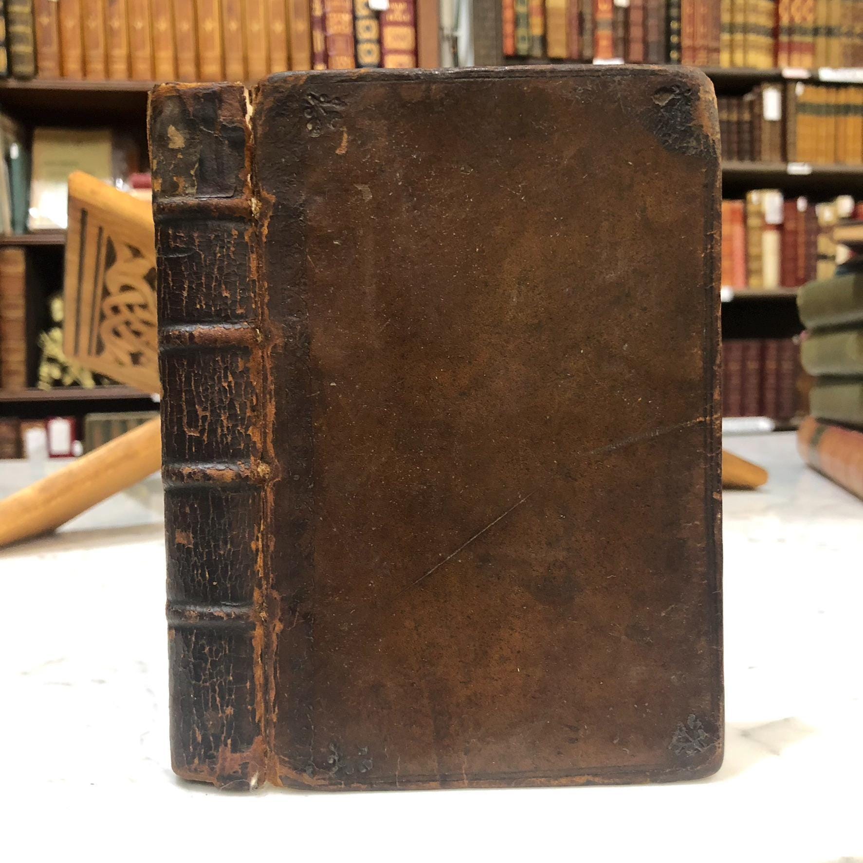 Hugo Grotius De Veritate Religionis Christianæ. Editio accuratior, Quam secundum recensuit, notulisque illustravit Joannes Clericus; cujus accessit De eligenda inter Christianos dissidentes Sententia, Liber Unicus. Translated: Hugo Grotius On The Truth Of The Christian Religion. A more accurate edition, Which has been revised a second time, and illustrated with notes by Johannes Clericus; to which has been added On choosing among Christians who disagree, An opinion, A single book. — photograph 2.