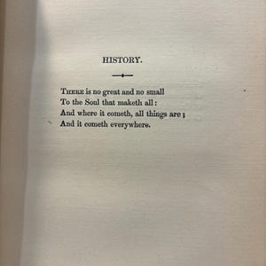 May include: An open book page with the title "HISTORY" at the top, followed by a poem. The text is in a classic serif font, printed in black ink on aged, off-white paper. The poem begins with the line "THERE is no great and no small."