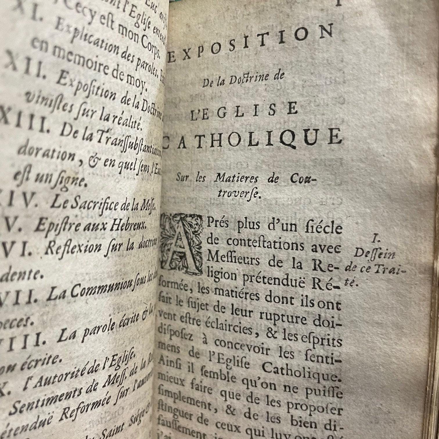Exposition De La Doctrine De L'eglise Catholique Sue les Matieres de Controverse. Par Messire Jacques Benigne Bossuet... Derniere Edition --- AND --- Re'ponse Au Livre de Mr. de Condom Intitule', Exposition de la Doctrine de l'Eglise Catholique, sur les Matieres de Controverse. Par Mr. de Brueys, Avocat de Montpelier. Derniere Edition, dans lauelle les Pages citees du Livre de Monsieur de Condom, sont reglees sur l'impression de ce Pai's. Translated from French: Exposition of the Doctrine of the Catholic Church on Controversial Matters. By Messire Jacques-Bénigne Bossuet... Latest Edition --- AND --- Response to the Book by Mr. de Condom Entitled 'Exposition of the Doctrine of the Catholic Church on Controversial Matters.' By Mr. de Brueys, Lawyer from Montpellier. Latest Edition, in which the cited pages from Mr. de Condom's book are aligned with the printing of this country. — photograph 7.