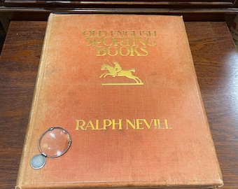 May include: A vintage book titled "Old English Sporting Books" by Ralph Nevill. The cover is a rich orange colour with gold lettering and a gold illustration of a rider on horseback.