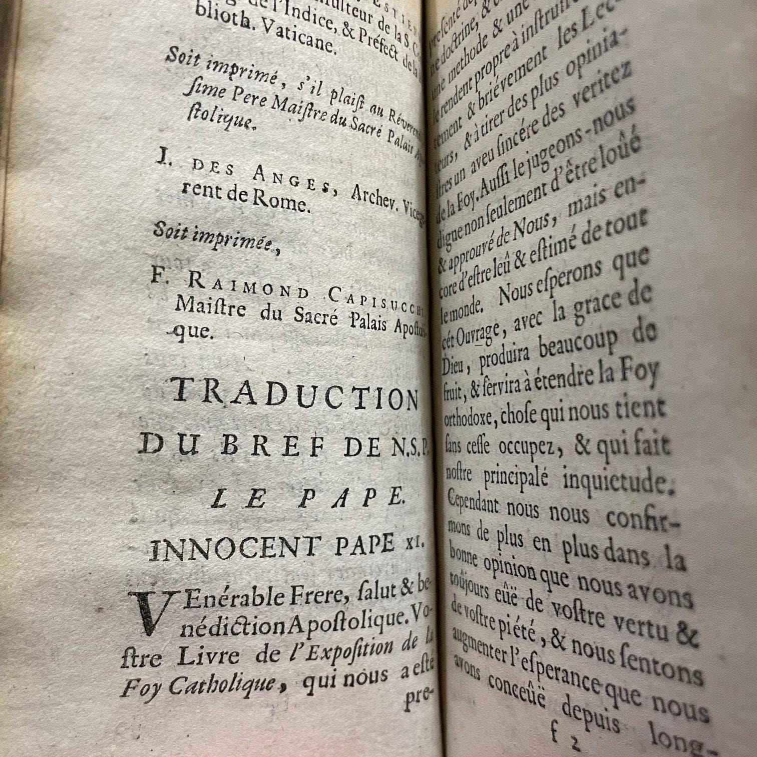 Exposition De La Doctrine De L'eglise Catholique Sue les Matieres de Controverse. Par Messire Jacques Benigne Bossuet... Derniere Edition --- AND --- Re'ponse Au Livre de Mr. de Condom Intitule', Exposition de la Doctrine de l'Eglise Catholique, sur les Matieres de Controverse. Par Mr. de Brueys, Avocat de Montpelier. Derniere Edition, dans lauelle les Pages citees du Livre de Monsieur de Condom, sont reglees sur l'impression de ce Pai's. Translated from French: Exposition of the Doctrine of the Catholic Church on Controversial Matters. By Messire Jacques-Bénigne Bossuet... Latest Edition --- AND --- Response to the Book by Mr. de Condom Entitled 'Exposition of the Doctrine of the Catholic Church on Controversial Matters.' By Mr. de Brueys, Lawyer from Montpellier. Latest Edition, in which the cited pages from Mr. de Condom's book are aligned with the printing of this country. — photograph 8.