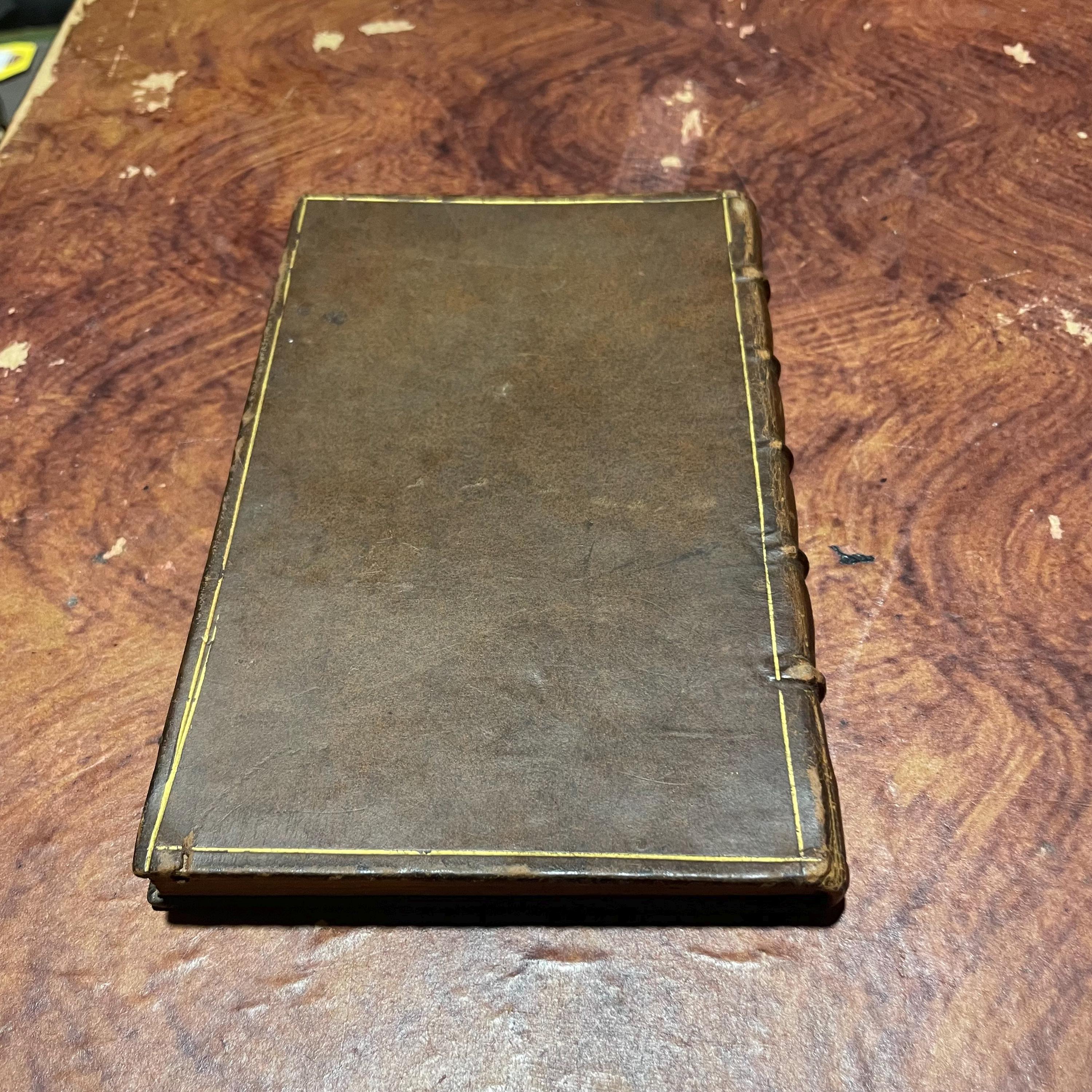 The Gentleman and Citizen's Almanack (By John Watson, Bookseller) For the Year of Our Lord, 1742. Being the Second after Leap-Year. And the Fifteenth Year of King Geo.II. Reign, till 11 june. Containing, The day of The Year and Month; The Week-Days nm=amed at Large; The Sun's Rising and Setting; The Moon's Age and Changes; The New Stile; A Table of Equation; The Time of Hig Water at Dublin-bar; the Times of Having the Lamps Light up in the City of Dublin; and The length of Twilight. Together with a new Sleaing Table, and Several other Tables, Renewed, Improved, or Continued. Likewaise, the Marriages and Deaths of The Princes of Europe. Also, the names of the Lord Lieutenantm Privy Council, The Lords and Commons of Parliment, (Printed by Authority,) The Judges, The Dublin Society, and several other Persons in Places of High Truct and Office in tis Kingdom, both Civil and Military: With the Prraemiums of The Dublin Society. To which are added, The Roads and Fairs of ireland. And a Table of Noted Places, referring to their several Post-Towns, considerably enlarged and made easier. The Whole Corrected at the Proper Offices, and more particularly referr'd to in the Contents. N.B. The Names of the Several Officers of the Four Courts are Printed here by the Leave of The Lord Chancellor and Judges. — photograph 2.