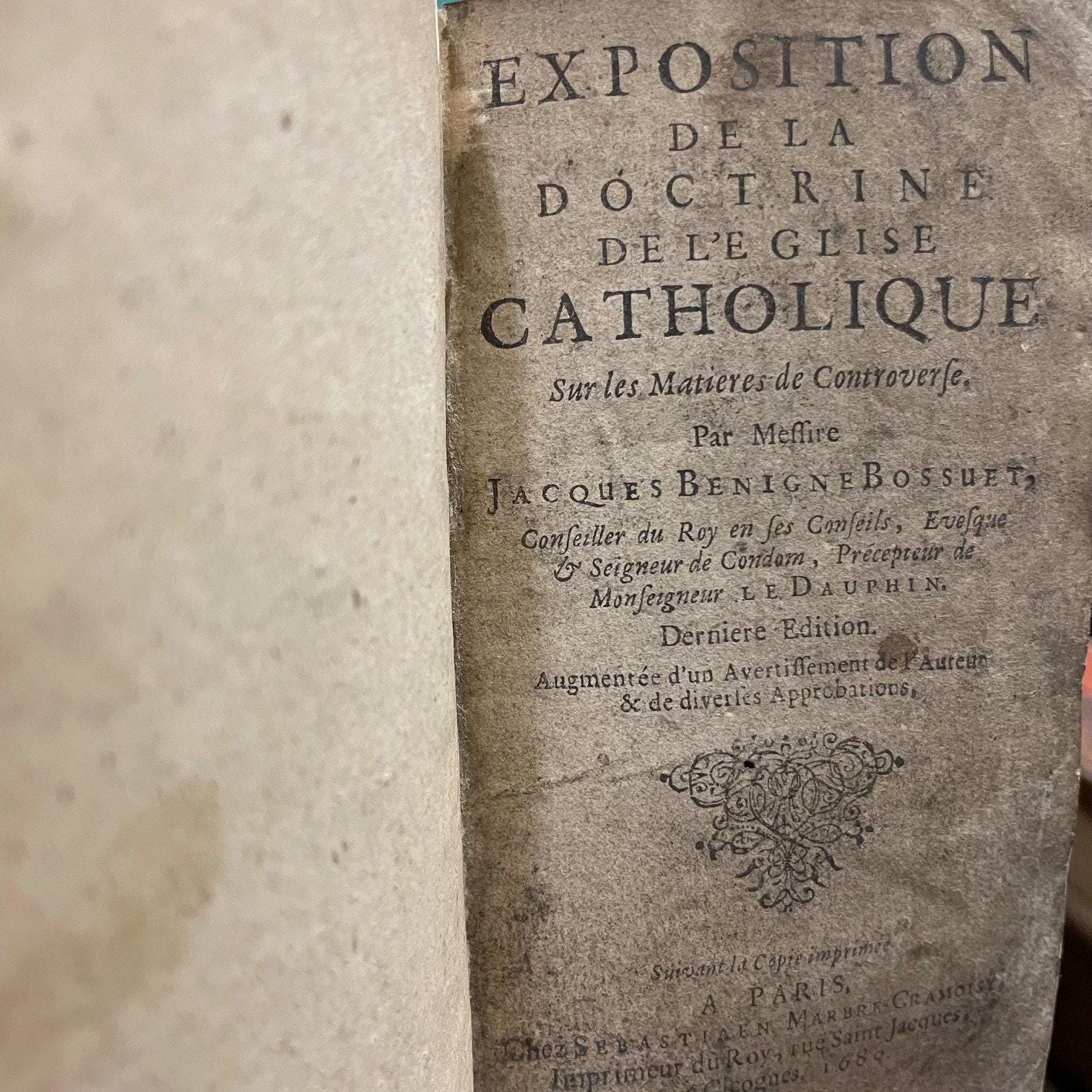 Exposition De La Doctrine De L'eglise Catholique Sue les Matieres de Controverse. Par Messire Jacques Benigne Bossuet... Derniere Edition --- AND --- Re'ponse Au Livre de Mr. de Condom Intitule', Exposition de la Doctrine de l'Eglise Catholique, sur les Matieres de Controverse. Par Mr. de Brueys, Avocat de Montpelier. Derniere Edition, dans lauelle les Pages citees du Livre de Monsieur de Condom, sont reglees sur l'impression de ce Pai's. Translated from French: Exposition of the Doctrine of the Catholic Church on Controversial Matters. By Messire Jacques-Bénigne Bossuet... Latest Edition --- AND --- Response to the Book by Mr. de Condom Entitled 'Exposition of the Doctrine of the Catholic Church on Controversial Matters.' By Mr. de Brueys, Lawyer from Montpellier. Latest Edition, in which the cited pages from Mr. de Condom's book are aligned with the printing of this country. — photograph 3.