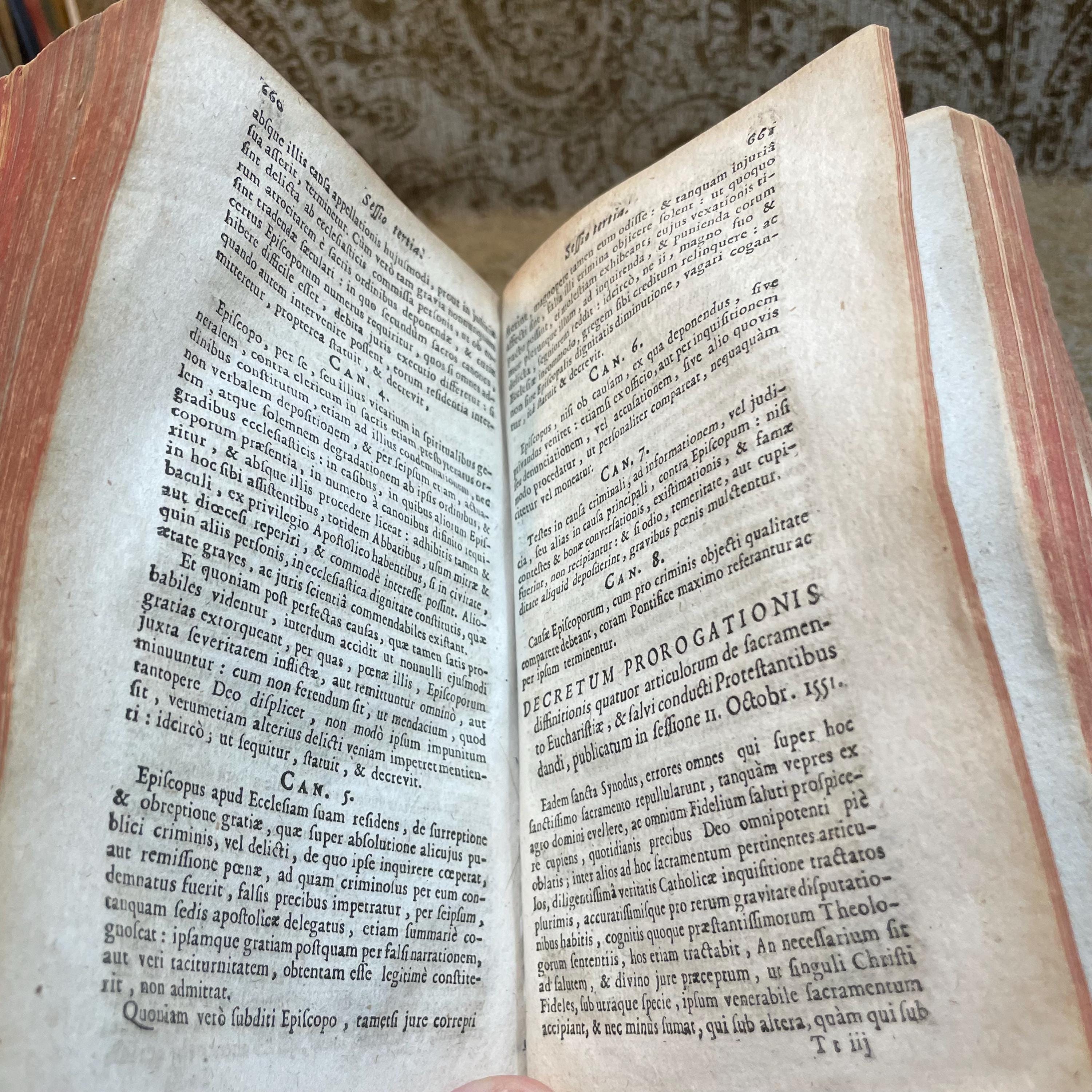 SUMMA OMNIUM CONCILIORUM ET PONTIFICUM, collecta per F. Barth. Carranzam Miranden. Ordinis Praedicatorum. Accesserunt Statuta quaedam Synodalia Parisiensis & Senonensis Ecclesiae. Appendix Conciliorum Galliæ collectionis P. Sirmondi, & Societate Nominis Jesu Presbyteri. Et Annotationes quam-plurimae Francisci Sylvii sacrae Theologiae Doctoris ejusdemque in Universitate Duacena Regii Professoris, pro commoda locorum difficiliorum intelligentia. Additae sunt etiam nonnullae Annotationes in hac nova Editione, quarum maximam partem habes in Prolegomenis. Translated: Summary Of All Councils And Pontiffs, compiled by F. Barth. Carranza of Miranda, of the Order of Preachers. Certain statutes have been added from the Synods of the Churches of Paris and Sens. An Appendix of French Councils from the collection of P. Sirmond, a Priest of the Society of Jesus. And numerous annotations by Francis Sylvius, Doctor of Sacred Theology and Royal Professor at the University of Douai, for the convenience of understanding difficult passages. Also included are several annotations in this new edition, most of which can be found in the Prolegomena. — photograph 8.