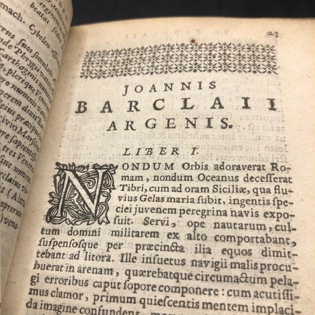 2 books bound as one. Argenis (Latin: Silver) and Euphormionis Lusinini, sive Ioannis Barclaii Satyricon, partes quinque cum clavi. Accessit Conspiratio Anglicana. (Latin: Euphormion Lusinini, or John Barclaius Satyricon, five parts with harpsichord. The English Conspiracy came.) — photograph 5.