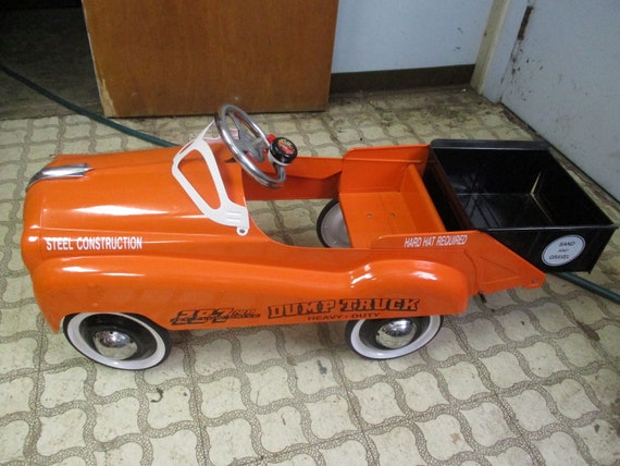 plastic pedal car