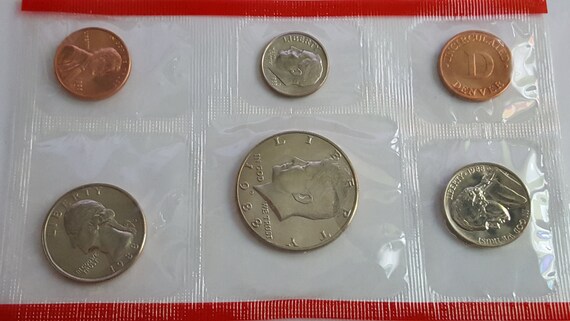 Brilliant Uncirculated in Original Mint Cello 1987 P+D Kennedy Half Dollar