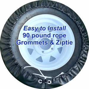 May include: Black tire cover with a white rim and a white tire. The cover has a drawstring closure with grommets and a 90 pound rope. The text "Easy to Install 90 pound rope Grommets & Ziptie" is printed in blue on the cover.