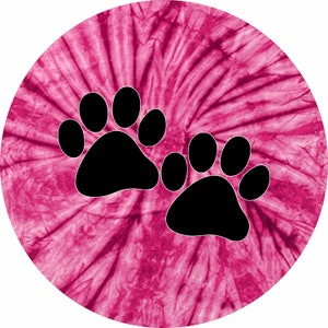 May include: Two black paw prints on a pink and white tie-dye background.