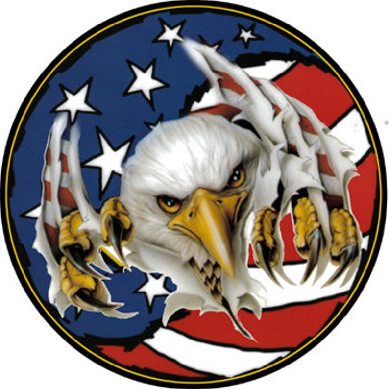 May include: A bald eagle with sharp talons is breaking through an American flag with red and white stripes and blue stars. The eagle's eyes are fierce and its beak is open.