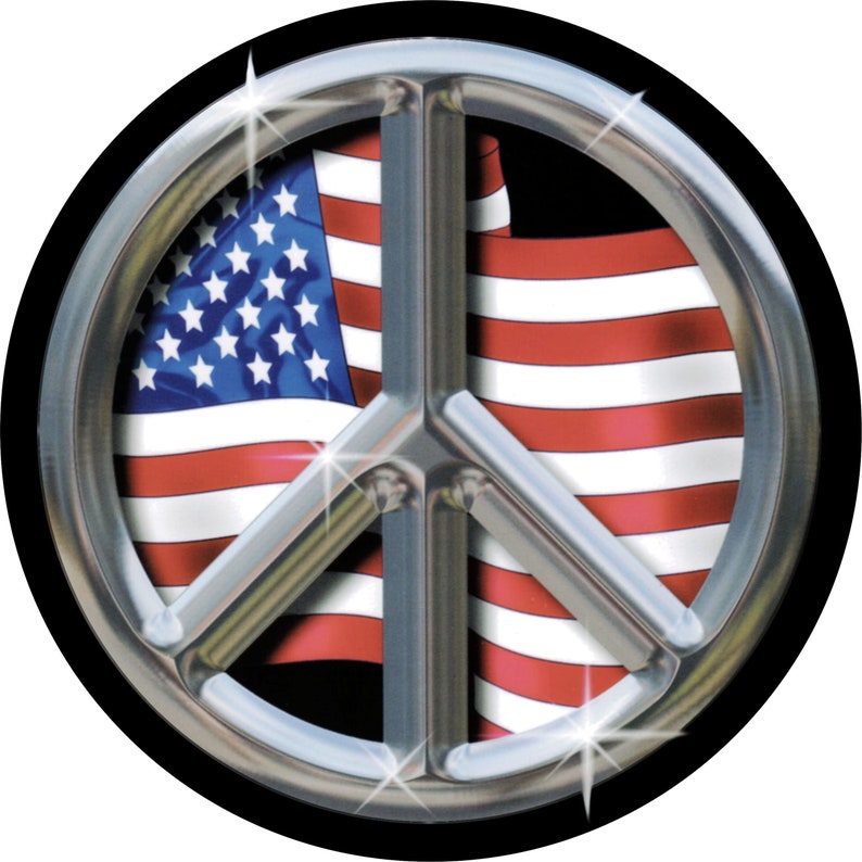May include: A round graphic featuring a silver peace symbol with a waving American flag in the background. The flag displays red and white stripes and a blue field with white stars. The peace symbol has a shiny, metallic appearance.