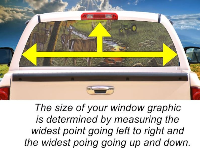 May include: A truck's rear window with a graphic of a forest scene featuring deer and a tractor. Yellow arrows indicate the measurement points for the graphic.