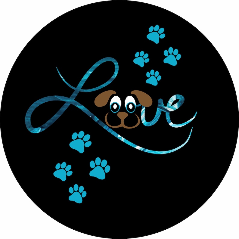 May include: A black circle with a blue and white swirl design. The word "Love" is written in a cursive font with a brown dog face in the center of the word. Blue paw prints are scattered around the design.