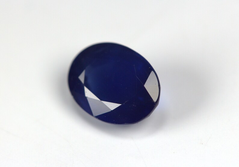 With Color Stripes Natural Sapphire 1.78 Carats Beautiful Color Earth Mined. 8 x 6 MM Certified Deep Blue