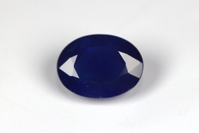 With Color Stripes Natural Sapphire 1.78 Carats Beautiful Color Earth Mined. 8 x 6 MM Certified Deep Blue