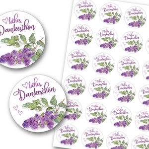 May include: A sheet of 24 round stickers with a lilac floral design and the text "liches Dankesch&ouml;n" in purple script. The stickers are perfect for adding a touch of elegance to gifts, thank you notes, or other special occasions.