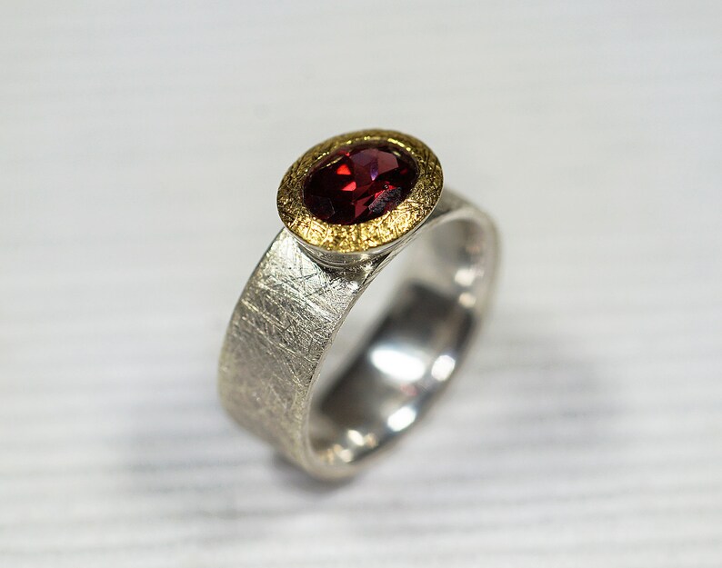 Garnet ring with wide rail