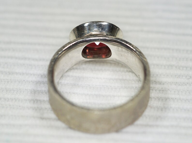 Garnet ring with wide rail