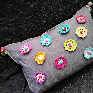 Denim pillow with crochet mandala