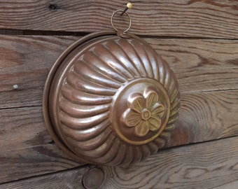 copper molds with flower design